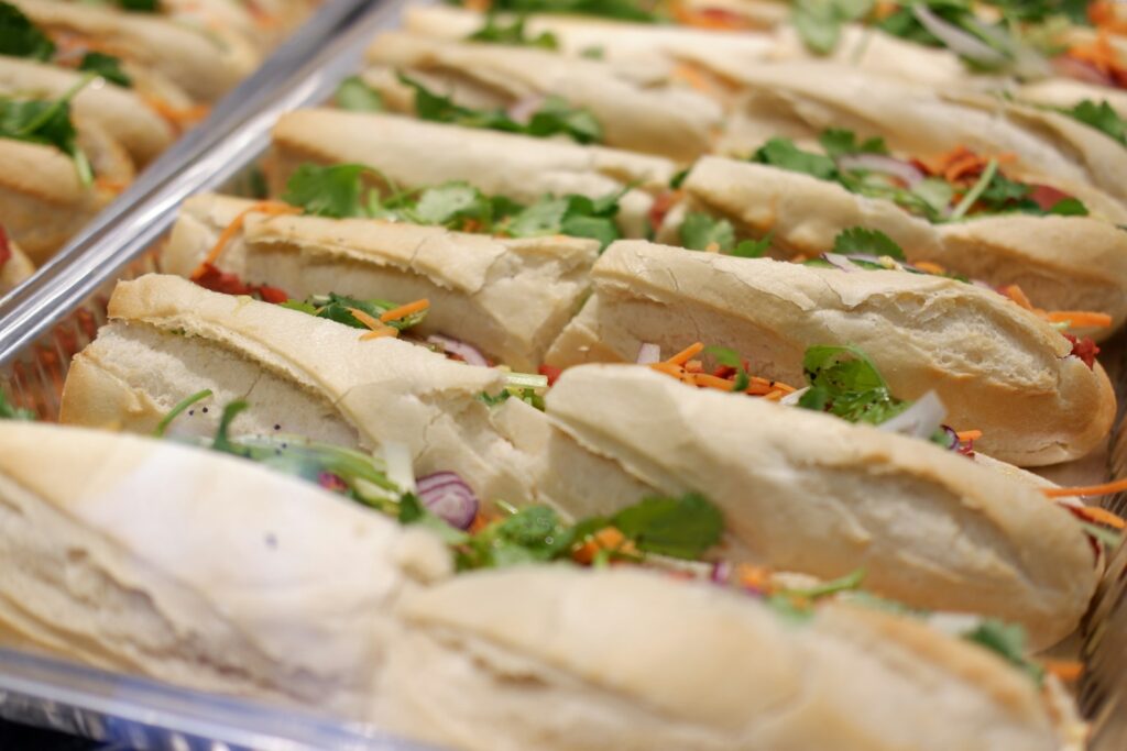a close up of a tray of banh mi